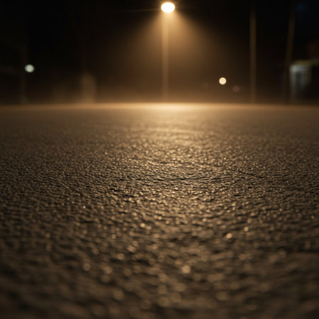 Night asphalt road with light from the street lamp. Abstract background.の素材