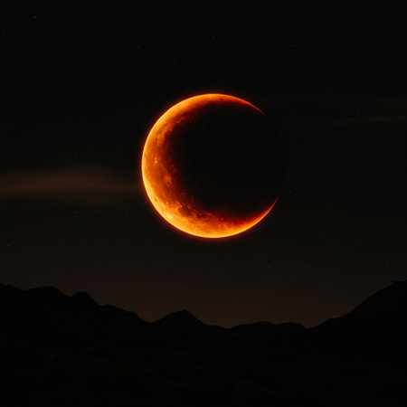 Full moon in the night sky with stars and the silhouette of mountainsの素材