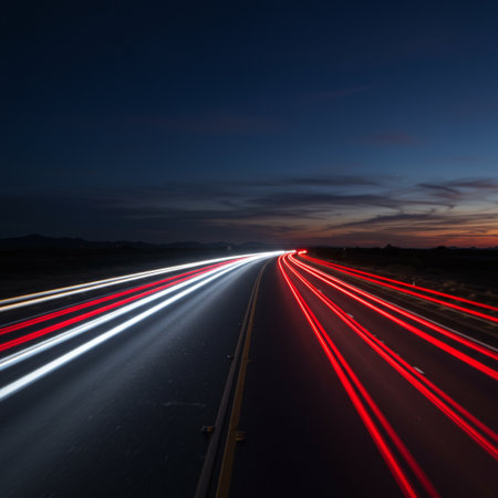 Car light trails on the road at night. Long exposure photo.の素材