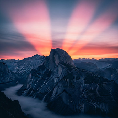 Mountain landscape with snow covered peaks at sunset. Beautiful natural backgroundの素材