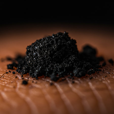 Pile of black coal on a wooden surface. Selective focus.の素材