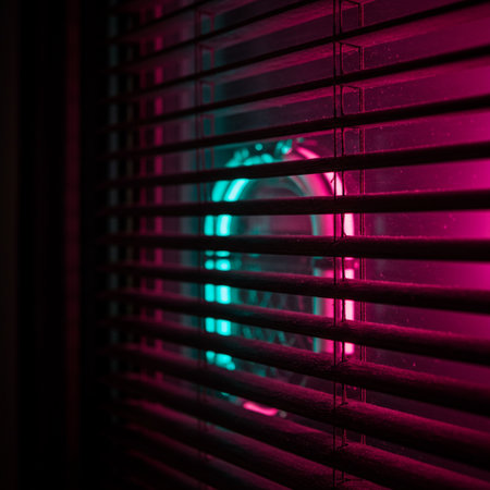 Blinds in the dark, close-up, red backgroundの素材