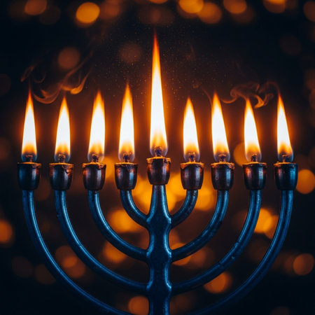 Jewish holiday Hanukkah background with menorah (traditional candelabra) and burning candlesの素材