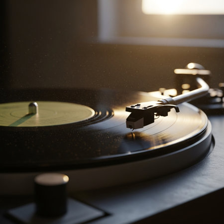 Retro turntable with vinyl record in dark room, closeupの素材