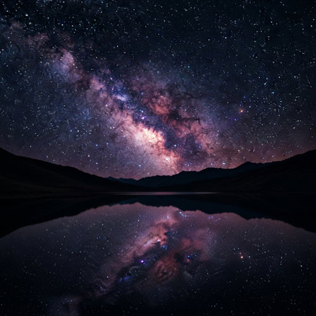 Milky way over mountain lake with starry sky and reflection in waterの素材