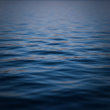 Blue sea water background. Close up of rippled water surfaceの素材