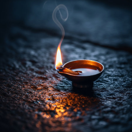 Burning diya lamps lit during Diwali celebration. Greeting card for Diwali.の素材