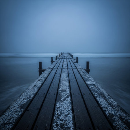 Wooden jetty on the Baltic Sea in a foggy day.の素材