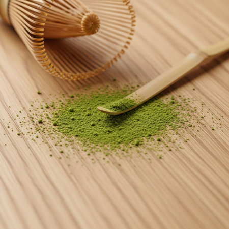 Matcha green tea powder and bamboo whisk on wooden table, closeupの素材