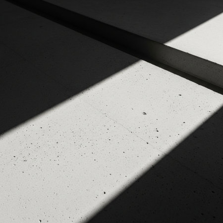 shadow on the concrete floor in a modern building, closeup of photoの素材