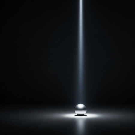 Illustration of a light beam shining through a glass ball on a dark backgroundの素材