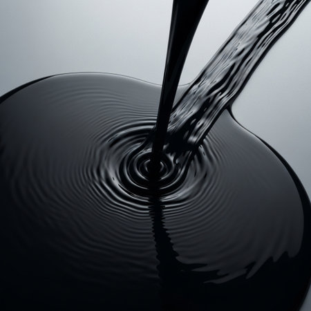 Pouring water on a black background. Abstract background for design.の素材