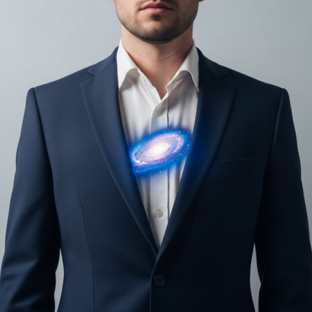 Close up of businessman with blue eye icon on his chest. Technology conceptの素材