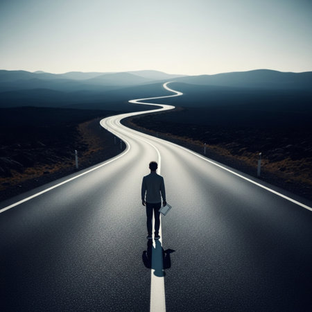 Businessman standing on asphalt road and holding briefcase. Concept of hitchhikingの素材