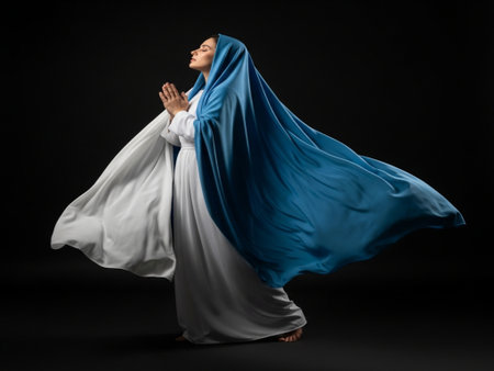 Young beautiful asian woman in white and blue cloth on black backgroundの素材