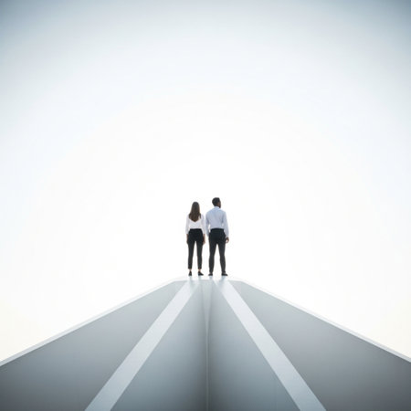 Businessman and businesswoman standing on the road leading to success conceptの素材