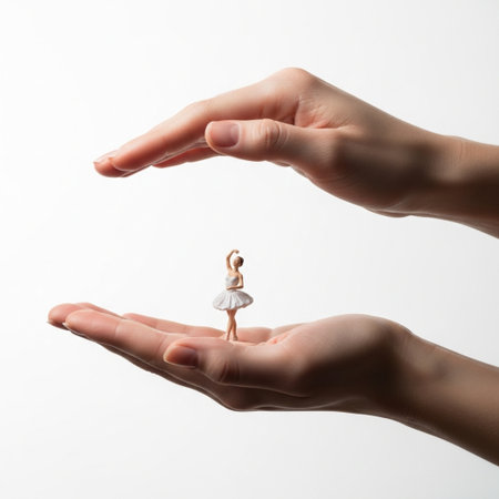 Little ballerina in a white tutu on a white backgroundの素材
