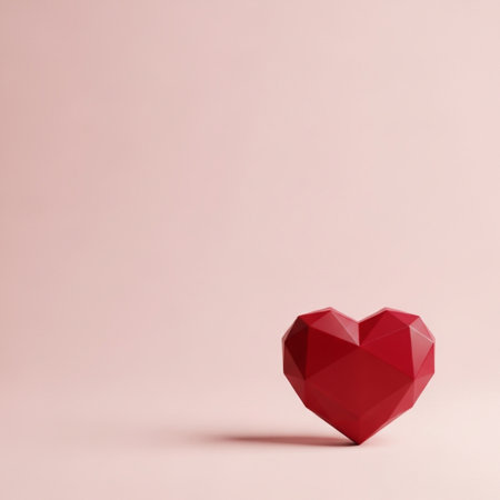 Red polygonal heart on pink background. Valentines day conceptの素材