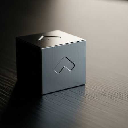 Close-up image of a metal cube on a dark background.の素材