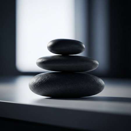 Stack of pebbles on black background. Zen concept. 3D Renderingの素材