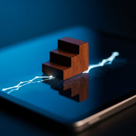 Wooden cubes on a tablet with a blue background. Business conceptの素材