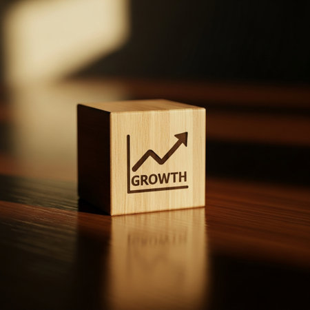 Wooden cube with growth graph. Business concept. Close up.の素材