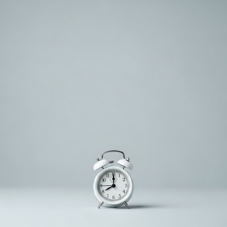 Alarm clock on white background. Time concept. 3D Renderingの素材