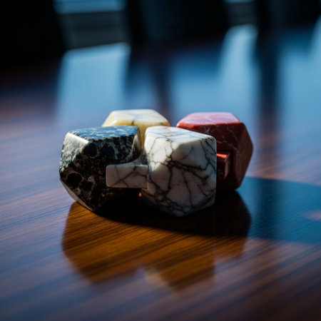 Colorful stone cubes on a wooden table. Selective focus.の素材