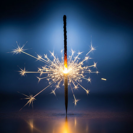 Burning sparkler on blue background. New Year and Christmas conceptの素材
