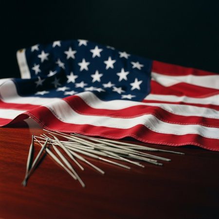 American flag and nails on a wooden table. American patriotic background.の素材