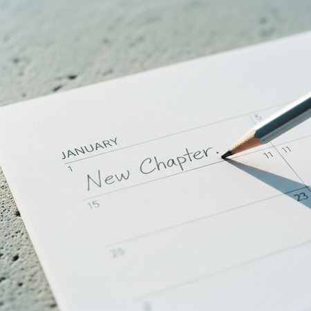 New year resolution concept, close up of calendar page with pencil.の素材