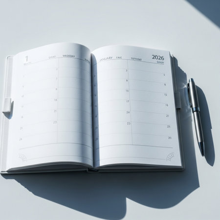 Notebook with pen on white background, business and planning concept.の素材