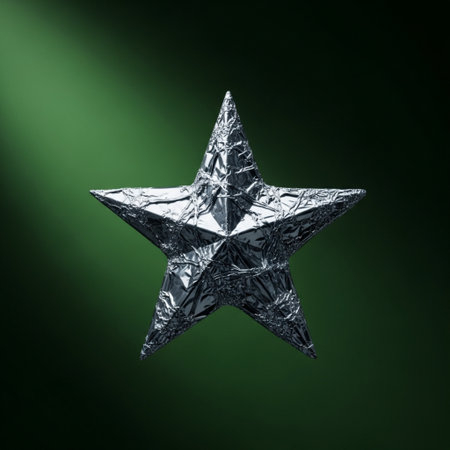 Silver star on a green background. Christmas and New Year concept.の素材