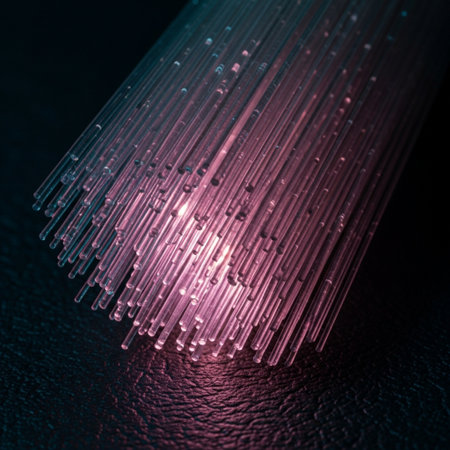 Close-up of a bundle of optical fibers on a black backgroundの素材
