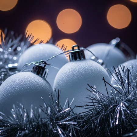 Christmas balls and tinsel with bokeh lights on background.の素材