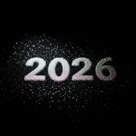 Silver glittering number 2016 on black background. Happy New Year concept.の素材