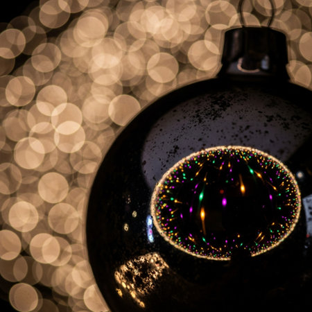 Close up of christmas bauble decoration on bokeh backgroundの素材