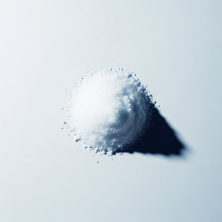 Sugar powder on a white background. Macro photo of sugar.の素材
