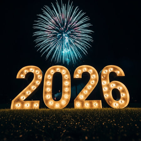 Happy new year 2016 written with LED lights on grass with fireworks backgroundの素材