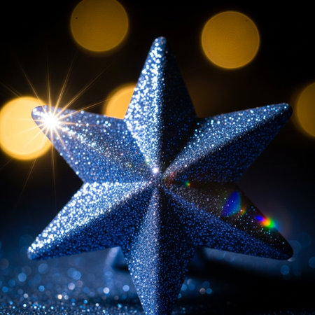 Blue Christmas star on a dark background with bokeh lights.の素材