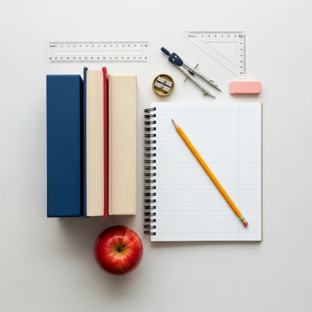 School supplies on white wooden background. Back to school concept. Flat lay, top view.の素材