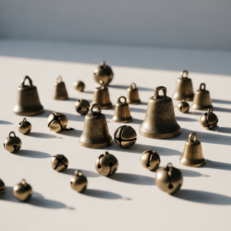 Group of bells on a white background with shadows. Minimalism.の素材