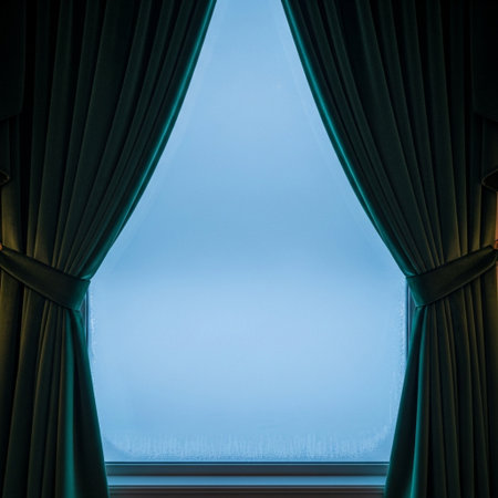 Curtains on the window with blue sky in the background.の素材