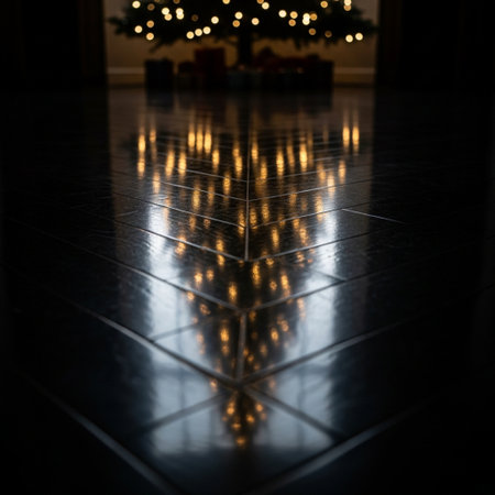 christmas tree and bokeh lights on the floor at nightの素材