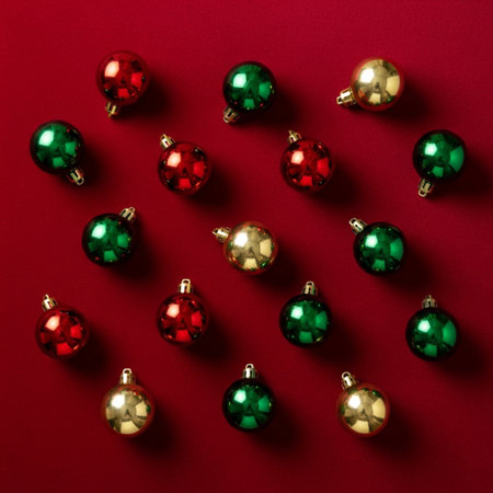 Christmas ornaments on red background. Flat lay, top view.の素材