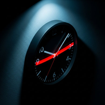 Black wall clock in dark room with red light. 3D Renderingの素材