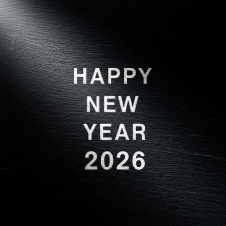 Happy New Year 2020 text on black chalkboard. Copy space for your textの素材