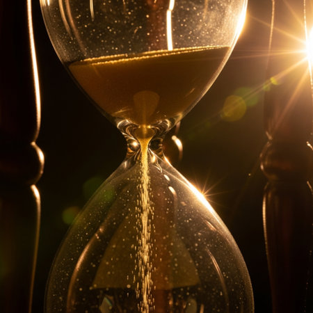 Hourglass with flowing sand on dark background. Time management concept.の素材
