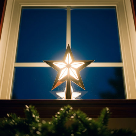 Christmas star on a window in a room with a large window.の素材