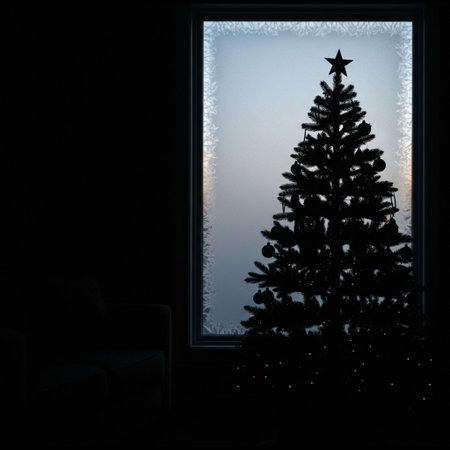 Silhouette of a Christmas tree on a background of a windowの素材